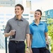 Devon & Jones CrownLux Performance Men's Address Melange Polo - Embroidery