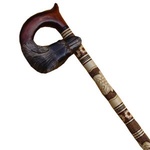 Carved Walking Stick - Gripping Wolf